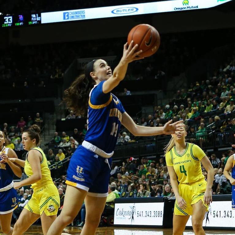 Jannon Otto and the UCR women's basketball team on the court